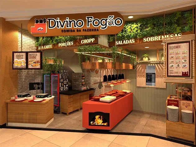 Loja do Divino Fogão num centro comercial, com balcão de serviço, forno central e sinalética de menu, projeto de padronização dirigido por Giovanna França